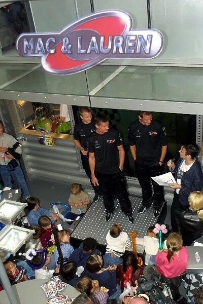 Formula One World Championship: The launch of the Mac and Lauren books in the McLaren motorhome, written by Lisa Dennis