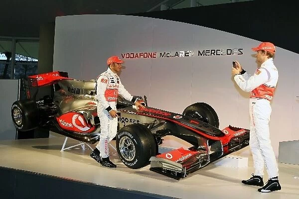 Formula One World Championship: Lewis Hamilton McLaren with team mate Jenson Button McLaren and the new McLaren MP4  /  25