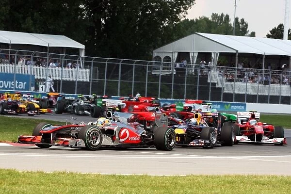 Formula One World Championship: Lewis Hamilton McLaren MP4  /  25 leads at the start of the race