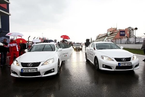 Formula One World Championship: The Lexus of Jarno Trulli Toyota and Timo Glock Toyota for their taxi rides