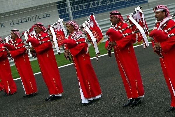 Formula One World Championship: Local musicians on the grid during a pre-race display