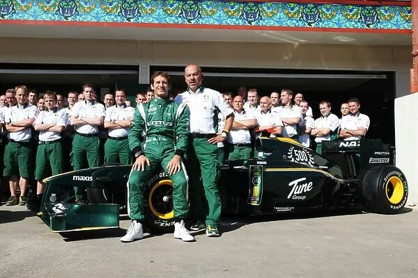 Formula One World Championship: A Lotus team photograph with Jarno Trulli Lotus and Mike Gascoyne Lotus F1 Racing Chief Technical Officer with