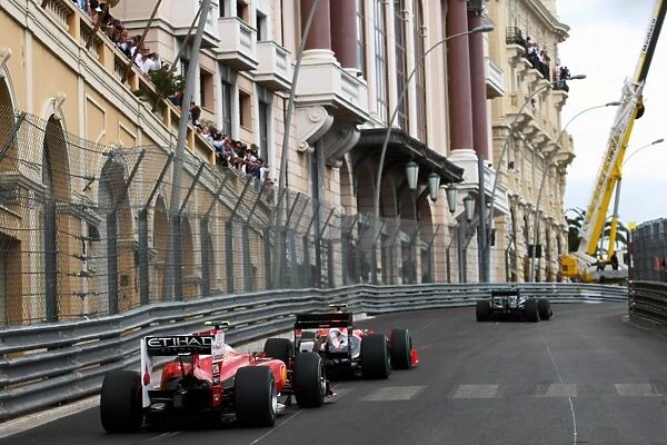 Formula One World Championship: Lucas di Grassi Virgin Racing VR-01 leads Fernando Alonso Ferrari F10