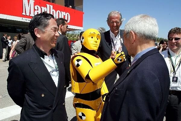 Formula One World Championship: A man dressed as a crash test dummy with some guests