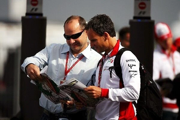Formula One World Championship: Manfred Zimmerman CMG manager of Adrian Sutil and Alex Leibinger Force India Physio