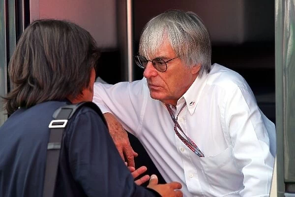 Formula One World Championship: Mario Mikakawa former manager of Jean Alesi with Bernie Ecclestone F1 Supremo