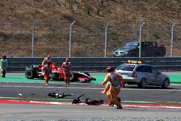 Formula One World Championship: Marshals see to the start crash
