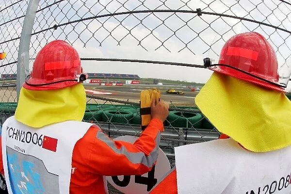 Formula One World Championship: Marshals by the trackside