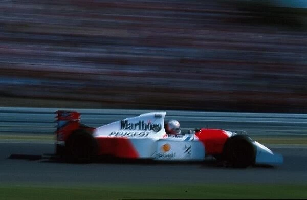 Formula One World Championship: Martin Brundle McLaren MP4  /  9 suffered with altenator problems on the last lap which dropped him from 3rd to 4th place