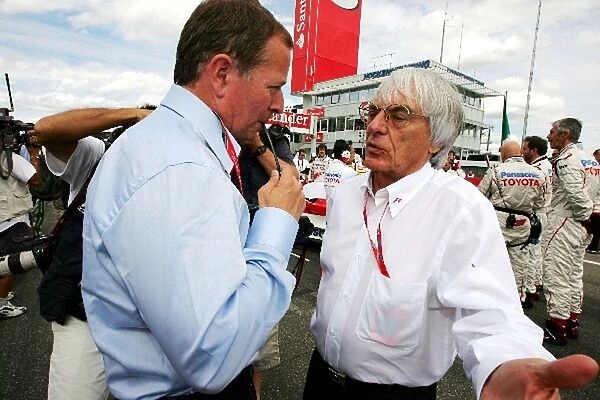 Formula One World Championship: Martin Brundle with Bernie Ecclestone F1 Supremo on the grid