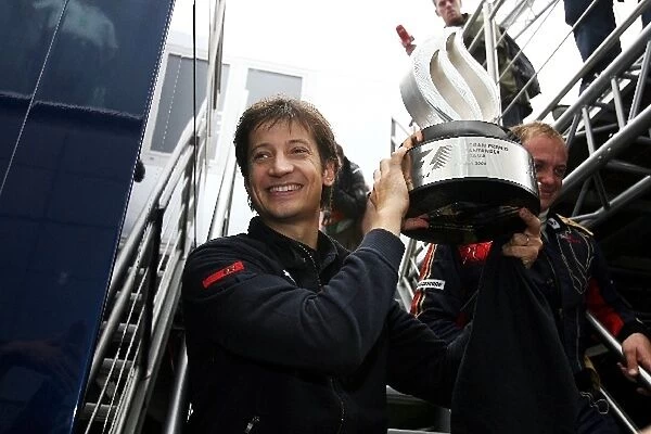 Formula One World Championship: Massimo Rivola Scuderia Toro Rosso Team Manager celebrates the first win for Sebastian Vettel Scuderia Toro Rosso