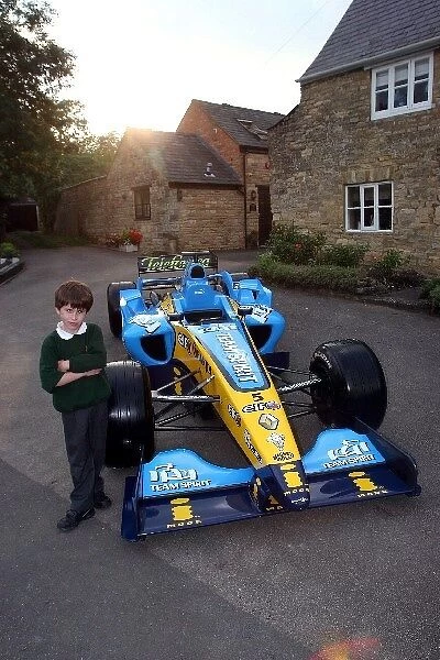 Formula One World Championship: Max Sutton with a Renault show car outside the Vine House restaurant in Paulerspury