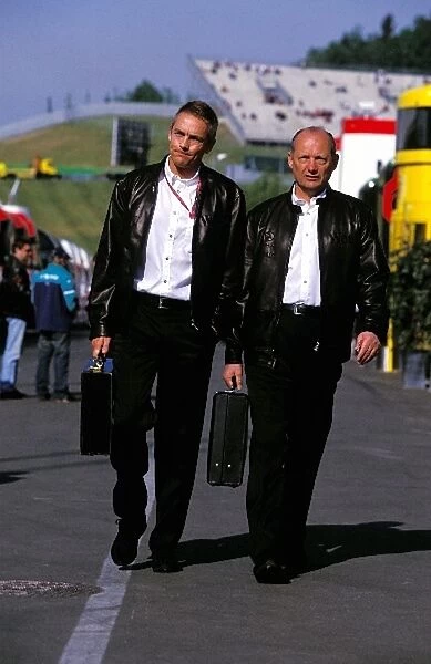 Formula One World Championship: McLaren Chairman and CEO Ron Dennis, right, with McLaren International Managing Director Martin Whitmarsh, left