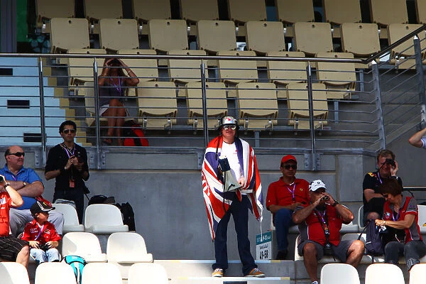 Formula One World Championship: McLaren fan Billy Hill AKA Billy The Piper in the Grandstand