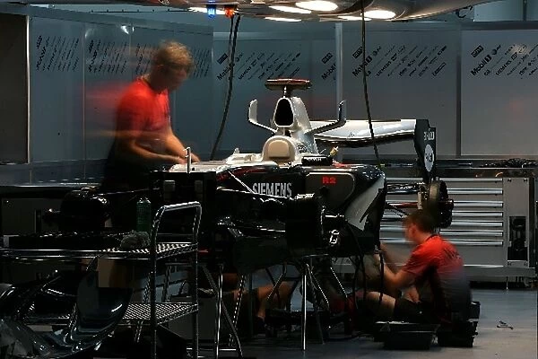 Formula One World Championship: McLaren mechanics work into the night