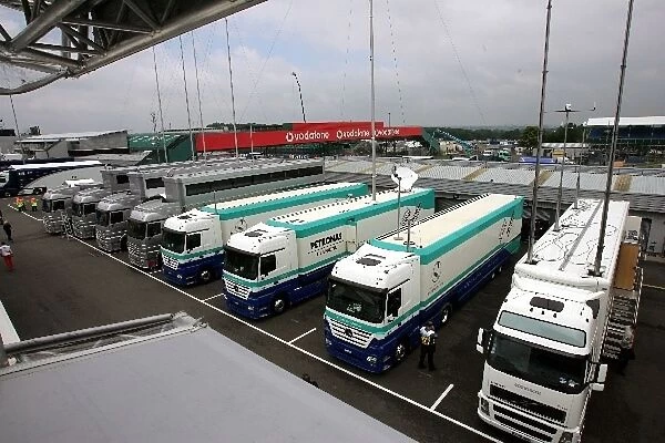 Formula One World Championship: McLaren and Sauber trucks in the paddock