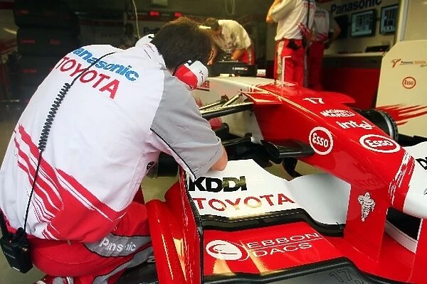Formula One World Championship: Mechanic works on the Toyota TF105 of Ralf Schumacher