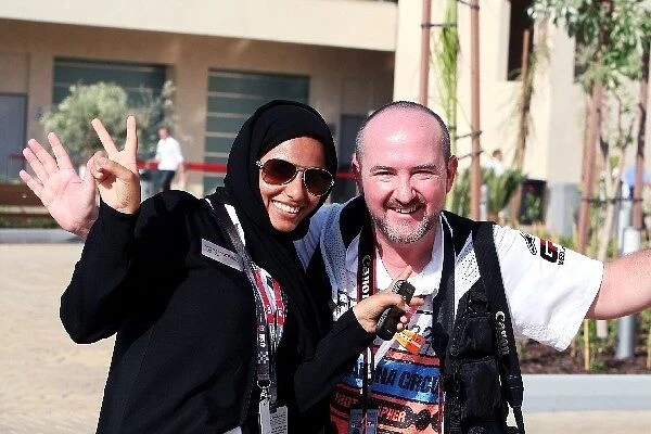 Formula One World Championship: Media Centre worker with Bob McCaffrey Photographer