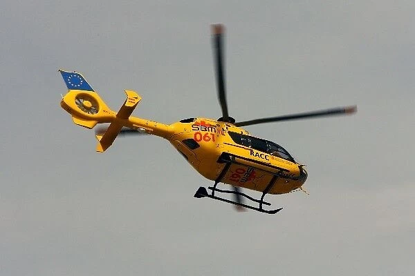 Formula One World Championship: The medical helicopter leaves with Heikki Kovalainen McLaren