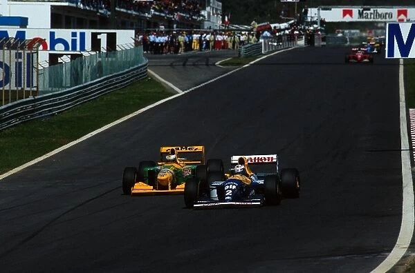 Formula One World Championship: Michael Schumacher Benetton B193A attempts to overtake Alain Prost