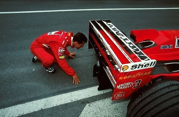 Formula One World Championship: Michael Schumacher Ferrari F300 breaks down