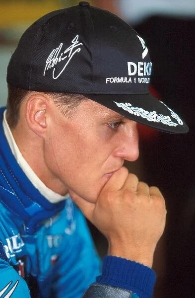 Formula One World Championship: Michael Schumacher is unhappy after his collision with Damon Hill