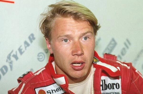 Formula One World Championship: Mika Hakkinen looks flustered after retiring 7 laps from the finish whilst in 5th place
