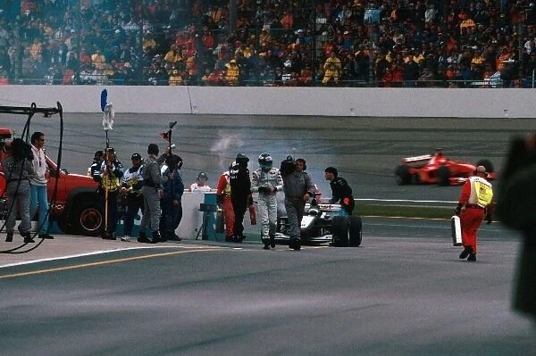 Formula One World Championship: Mika Hakkinen Mclaren MP4-15 engine blows and maybe the championship as well