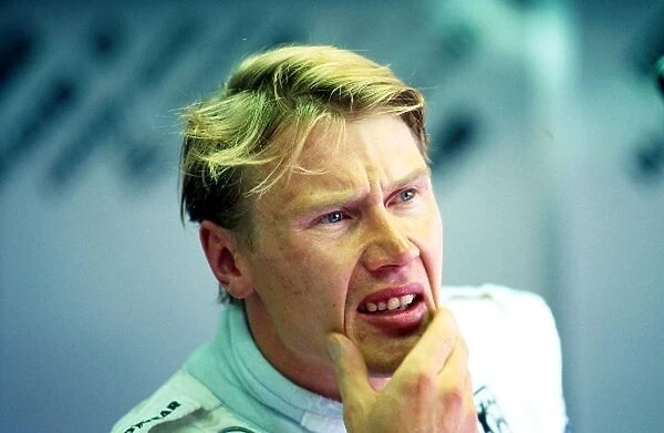 Formula One World Championship: Mika Hakkinen Mclaren sees his provisional pole position time beaten in the dying seconds of qualifying
