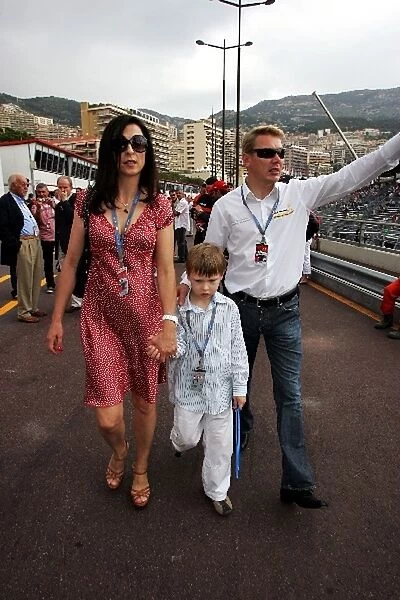 Formula One World Championship: Mika Hakkinen with son Hugo and wife Erja