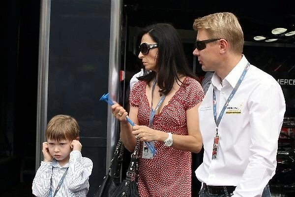 Formula One World Championship: Mika Hakkinen with his wife Erja Hakkinen and his son Hugo Hakkinen