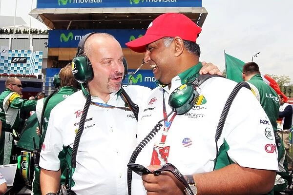 Formula One World Championship: Mike Gascoyne Lotus F1 Racing Chief Technical Officer with Tony Fernandes Lotus F1 Team Principal on the grid