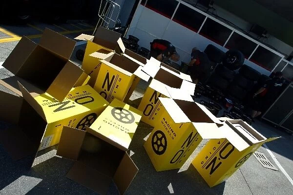Formula One World Championship: Minardi get out their brand new OZ wheels from their boxes
