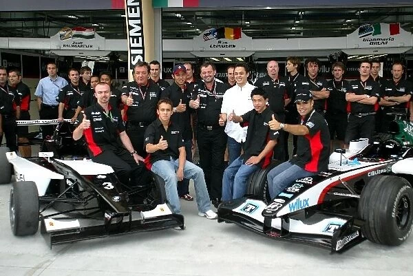 Formula One World Championship: The Minardi F1 team meet the Minardi Team Asia Formula BMW Team in the pitlane