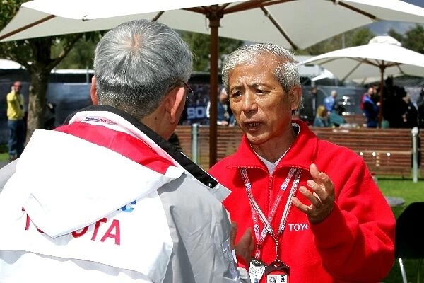 Formula One World Championship: Mr Saito Toyota talks with Tsutomu Tomita Chairman of Toyota Racing and Toyota Team Principal