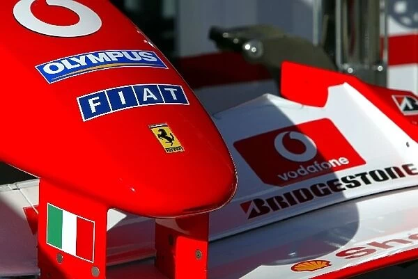 Formula One World Championship: New Olympus branding on the nose of the Ferrari