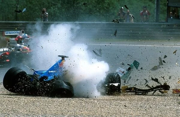 Formula One World Championship: Nick Heidfeld had a massive accident when he span and collided with Takuma Sato Jordan Honda EJ12