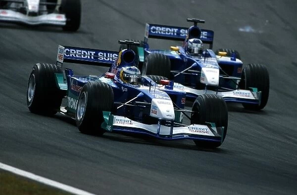 Formula One World Championship: Nick Heidfeld Sauber Petronas C20 leads team-mate Kimi Raikkonen