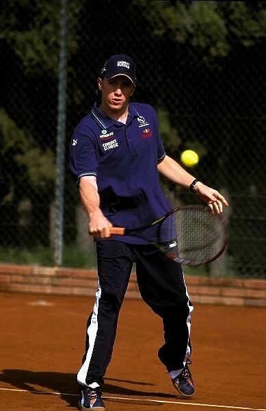 Formula One World Championship: Nick Heidfeld Sauber took time out to play tennis at the Sanchez tennis academy