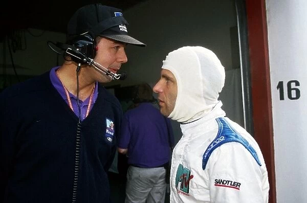 Formula One World Championship: Nick Wirth Simtek Team Principal talks with Roland Ratzenberger Simtek, who was tragically killed in an accident
