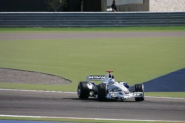 Formula One World Championship: Nico Rosberg Williams FW28 spins at the start of the race