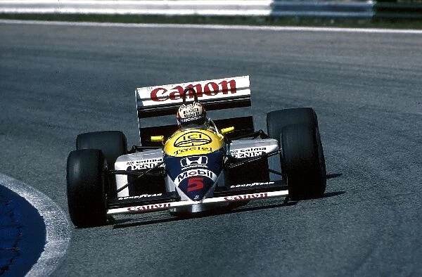 Formula One World Championship: Nigel Mansell Williams FW11 retired with a broken cv joint