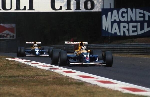 Formula One World Championship: Nigel Mansell Williams FW14 leads team mate Riccardo Patrese on his way to victory