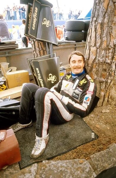 Formula One World Championship: Nigel Mansell relaxing before the race