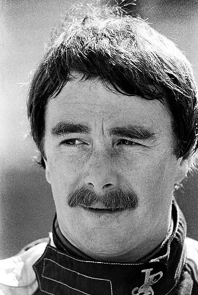 Formula One World Championship: Nigel Mansell Lotus retired from the race on lap 15 with a broken clutch
