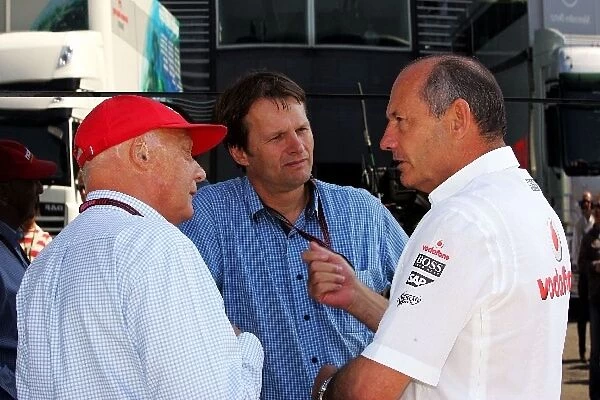 Formula One World Championship: Niki Lauda with Michael Schmidt Journalist and Ron Dennis McLaren Team Principal
