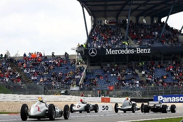 Formula One World Championship: Old Mercedes drive the circuit