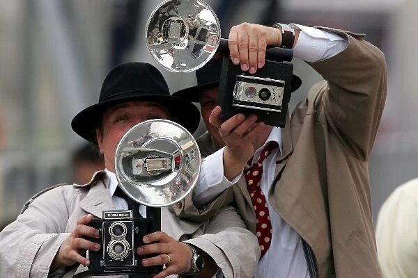 Formula One World Championship: Paparazzi photographers in the paddock