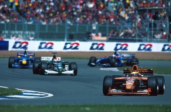 Formula One World Championship: Pedro De La Rosa Arrows Supertec A21 leads Johnny Herbert Jaguar Cosworth R1