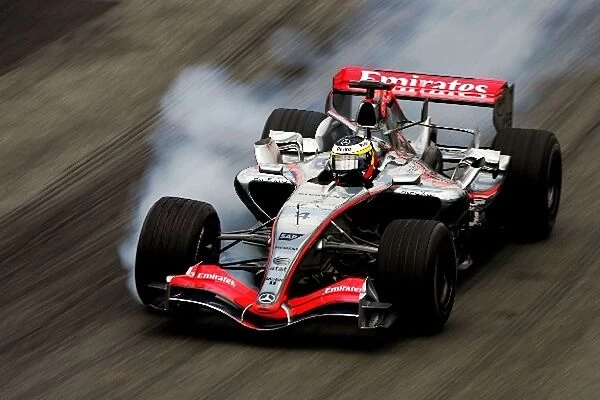 Formula One World Championship: Pedro de la Rosa McLaren Mercedes MP4  /  21 locks a wheel